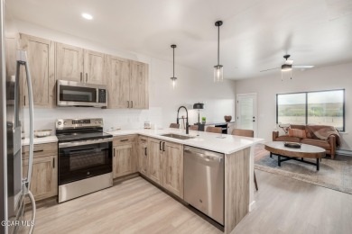 Discover this brand-new 2-bedroom townhome in Granby Ranch! on Headwaters Golf Course At Granby Ranch in Colorado - for sale on GolfHomes.com, golf home, golf lot
