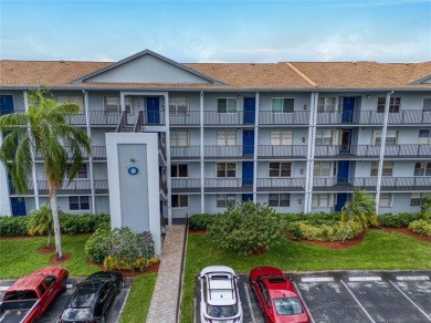 800 SW 125th Way 202 on Flamingo Lakes Country Club in Florida - for sale on GolfHomes.com, golf home, golf lot