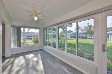 Located on a quiet cul-de-sac and just steps from the covered on Kings Point Executive Golf Course in Florida - for sale on GolfHomes.com, golf home, golf lot
