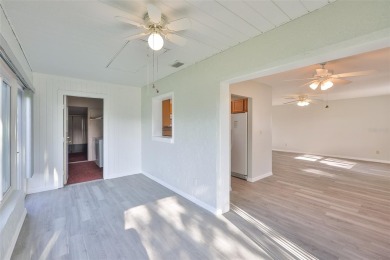 Located on a quiet cul-de-sac and just steps from the covered on Kings Point Executive Golf Course in Florida - for sale on GolfHomes.com, golf home, golf lot