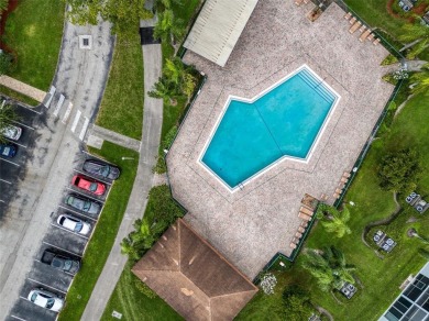 800 SW 125th Way 202 on Flamingo Lakes Country Club in Florida - for sale on GolfHomes.com, golf home, golf lot
