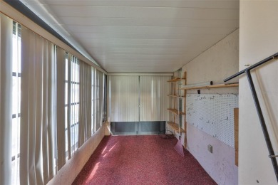 Located on a quiet cul-de-sac and just steps from the covered on Kings Point Executive Golf Course in Florida - for sale on GolfHomes.com, golf home, golf lot