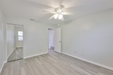 Located on a quiet cul-de-sac and just steps from the covered on Kings Point Executive Golf Course in Florida - for sale on GolfHomes.com, golf home, golf lot