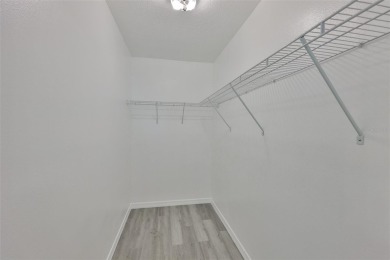 Located on a quiet cul-de-sac and just steps from the covered on Kings Point Executive Golf Course in Florida - for sale on GolfHomes.com, golf home, golf lot