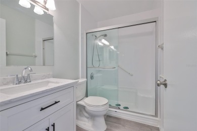 Located on a quiet cul-de-sac and just steps from the covered on Kings Point Executive Golf Course in Florida - for sale on GolfHomes.com, golf home, golf lot