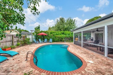 Discover this Delray Beach 4-bedroom, 2.5 bath pool home on Delray Beach Golf Club in Florida - for sale on GolfHomes.com, golf home, golf lot