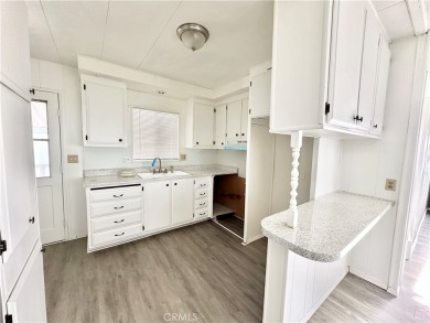 This charming 2 bedroom, 2 bathroom mobile home is located in on Hidden Springs Country Club in California - for sale on GolfHomes.com, golf home, golf lot