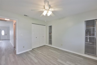 Located on a quiet cul-de-sac and just steps from the covered on Kings Point Executive Golf Course in Florida - for sale on GolfHomes.com, golf home, golf lot