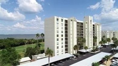 Breathtaking panoramic views of Tampa Bay and the lush fairways on Cove Cay Country Club in Florida - for sale on GolfHomes.com, golf home, golf lot