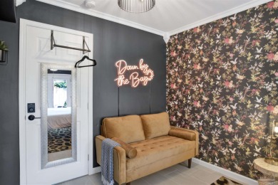 Welcome to this charming Bayshore bungalow, where timeless on Pensacola Country Club in Florida - for sale on GolfHomes.com, golf home, golf lot