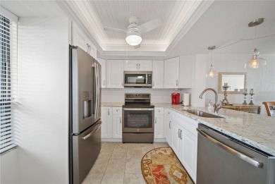Breathtaking panoramic views of Tampa Bay and the lush fairways on Cove Cay Country Club in Florida - for sale on GolfHomes.com, golf home, golf lot