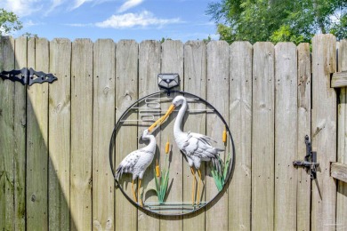 Welcome to this charming Bayshore bungalow, where timeless on Pensacola Country Club in Florida - for sale on GolfHomes.com, golf home, golf lot