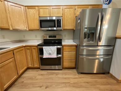 LOVE GOLF??? Check out this great townhome on the 9th hole! on The Ponds Golf Club in Minnesota - for sale on GolfHomes.com, golf home, golf lot