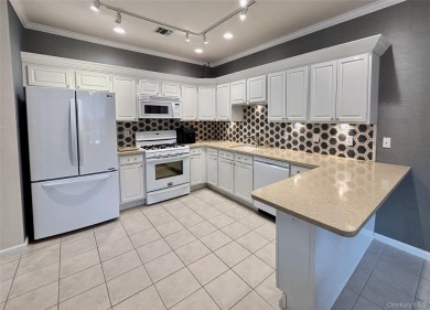 Immaculate Medici Model 2-bedroom, 2.5-bath (Primary on the on The Greens At Half Hollow in New York - for sale on GolfHomes.com, golf home, golf lot