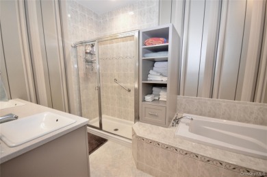 Immaculate Medici Model 2-bedroom, 2.5-bath (Primary on the on The Greens At Half Hollow in New York - for sale on GolfHomes.com, golf home, golf lot