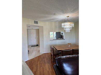 INVESTORS' DREAM - NO RENTAL WAITING PERIOD! Spacious 2BR/2BA, 1 on Flamingo Lakes Country Club in Florida - for sale on GolfHomes.com, golf home, golf lot