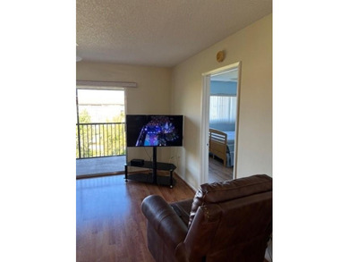 INVESTORS' DREAM - NO RENTAL WAITING PERIOD! Spacious 2BR/2BA, 1 on Flamingo Lakes Country Club in Florida - for sale on GolfHomes.com, golf home, golf lot