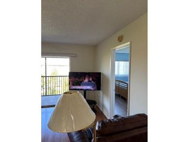 INVESTORS' DREAM - NO RENTAL WAITING PERIOD! Spacious 2BR/2BA, 1 on Flamingo Lakes Country Club in Florida - for sale on GolfHomes.com, golf home, golf lot