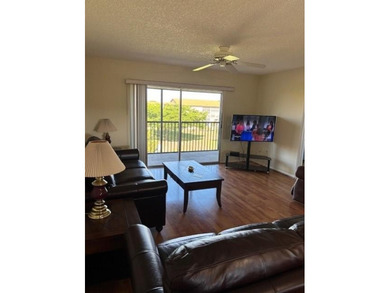 INVESTORS' DREAM - NO RENTAL WAITING PERIOD! Spacious 2BR/2BA, 1 on Flamingo Lakes Country Club in Florida - for sale on GolfHomes.com, golf home, golf lot