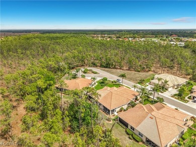Enjoy easy maintenance living with no carpet, featuring tile and on Herons Glen Golf and Country Club in Florida - for sale on GolfHomes.com, golf home, golf lot