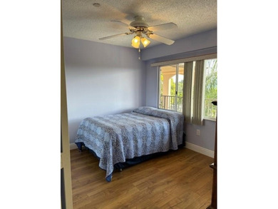 INVESTORS' DREAM - NO RENTAL WAITING PERIOD! Spacious 2BR/2BA, 1 on Flamingo Lakes Country Club in Florida - for sale on GolfHomes.com, golf home, golf lot