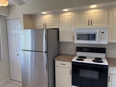 INVESTORS' DREAM - NO RENTAL WAITING PERIOD! Spacious 2BR/2BA, 1 on Flamingo Lakes Country Club in Florida - for sale on GolfHomes.com, golf home, golf lot