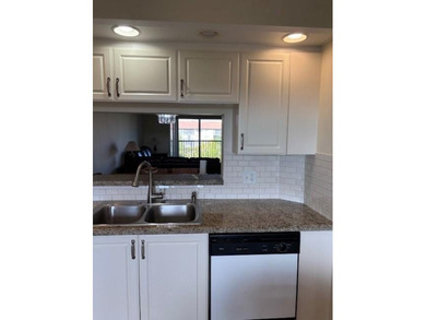 INVESTORS' DREAM - NO RENTAL WAITING PERIOD! Spacious 2BR/2BA, 1 on Flamingo Lakes Country Club in Florida - for sale on GolfHomes.com, golf home, golf lot