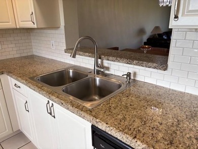 INVESTORS' DREAM - NO RENTAL WAITING PERIOD! Spacious 2BR/2BA, 1 on Flamingo Lakes Country Club in Florida - for sale on GolfHomes.com, golf home, golf lot