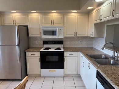 INVESTORS' DREAM - NO RENTAL WAITING PERIOD! Spacious 2BR/2BA, 1 on Flamingo Lakes Country Club in Florida - for sale on GolfHomes.com, golf home, golf lot