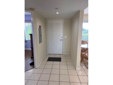 INVESTORS' DREAM - NO RENTAL WAITING PERIOD! Spacious 2BR/2BA, 1 on Flamingo Lakes Country Club in Florida - for sale on GolfHomes.com, golf home, golf lot