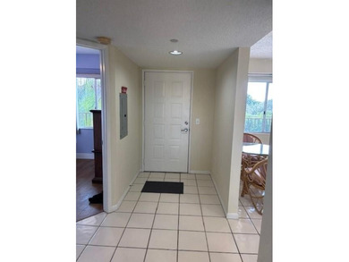 INVESTORS' DREAM - NO RENTAL WAITING PERIOD! Spacious 2BR/2BA, 1 on Flamingo Lakes Country Club in Florida - for sale on GolfHomes.com, golf home, golf lot