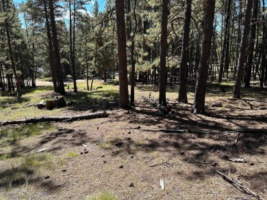 This flat lot near the golf course on a quiet curve is the on Angel Fire Resort Country Club in New Mexico - for sale on GolfHomes.com, golf home, golf lot