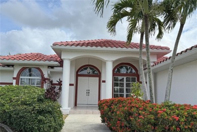 Impressive WATERFRONT 3 Bedroom, 2.5 Bathroom home with attached on Saint Andrews South Golf Club in Florida - for sale on GolfHomes.com, golf home, golf lot