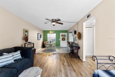 Experience easy Florida living in this bright and spacious on Tarpon Springs Golf Course in Florida - for sale on GolfHomes.com, golf home, golf lot