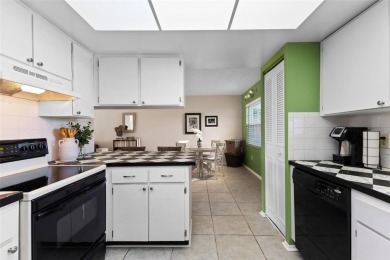 Experience easy Florida living in this bright and spacious on Tarpon Springs Golf Course in Florida - for sale on GolfHomes.com, golf home, golf lot