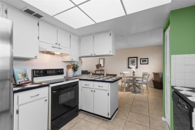 Experience easy Florida living in this bright and spacious on Tarpon Springs Golf Course in Florida - for sale on GolfHomes.com, golf home, golf lot