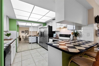 Experience easy Florida living in this bright and spacious on Tarpon Springs Golf Course in Florida - for sale on GolfHomes.com, golf home, golf lot