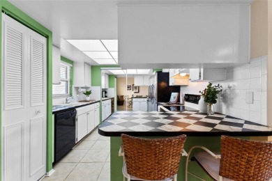 Experience easy Florida living in this bright and spacious on Tarpon Springs Golf Course in Florida - for sale on GolfHomes.com, golf home, golf lot
