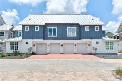 Luxury townhome centrally located in the upscale Palmilla Beach on Palmilla Beach Golf Club in Texas - for sale on GolfHomes.com, golf home, golf lot