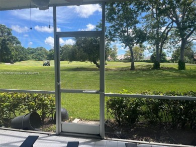 This spacious corner unit condo features 2 bedroom, 2 bath & a on Woodmont Country Club in Florida - for sale on GolfHomes.com, golf home, golf lot