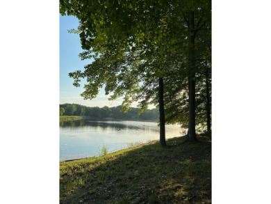 Rare Find!  Over 1 acre + 200' Waterfrontage on Fawn Lake on Canadian Lakes Country Club-The Royal Course in Michigan - for sale on GolfHomes.com, golf home, golf lot