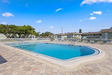 Experience easy Florida living in this bright and spacious on Tarpon Springs Golf Course in Florida - for sale on GolfHomes.com, golf home, golf lot