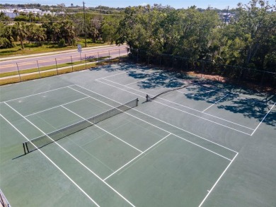 Experience easy Florida living in this bright and spacious on Tarpon Springs Golf Course in Florida - for sale on GolfHomes.com, golf home, golf lot