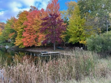 Rare Find!  Over 1 acre + 200' Waterfrontage on Fawn Lake on Canadian Lakes Country Club-The Royal Course in Michigan - for sale on GolfHomes.com, golf home, golf lot