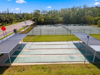 Experience easy Florida living in this bright and spacious on Tarpon Springs Golf Course in Florida - for sale on GolfHomes.com, golf home, golf lot