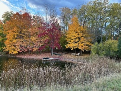 Rare Find!  Over 1 acre + 200' Waterfrontage on Fawn Lake on Canadian Lakes Country Club-The Royal Course in Michigan - for sale on GolfHomes.com, golf home, golf lot