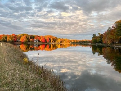 Rare Find!  Over 1 acre + 200' Waterfrontage on Fawn Lake on Canadian Lakes Country Club-The Royal Course in Michigan - for sale on GolfHomes.com, golf home, golf lot