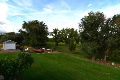 Fresh air, green grass, blue skies, and the gorgeous, manicured on Cottonwood Country Club in Montana - for sale on GolfHomes.com, golf home, golf lot