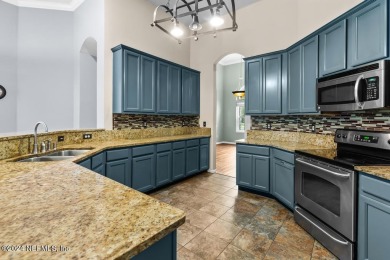 Located in Fleming Island's Eagle Harbor, this elegant 5-bed on Eagle Harbor Golf Club in Florida - for sale on GolfHomes.com, golf home, golf lot