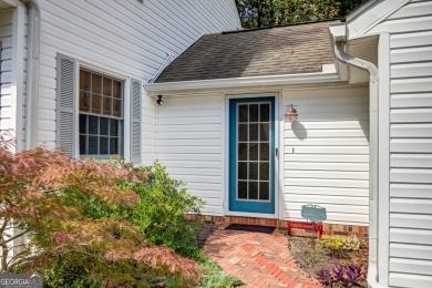Welcome to this charming home full of character, nestled on a on Canongate At Flat Creek Club in Georgia - for sale on GolfHomes.com, golf home, golf lot